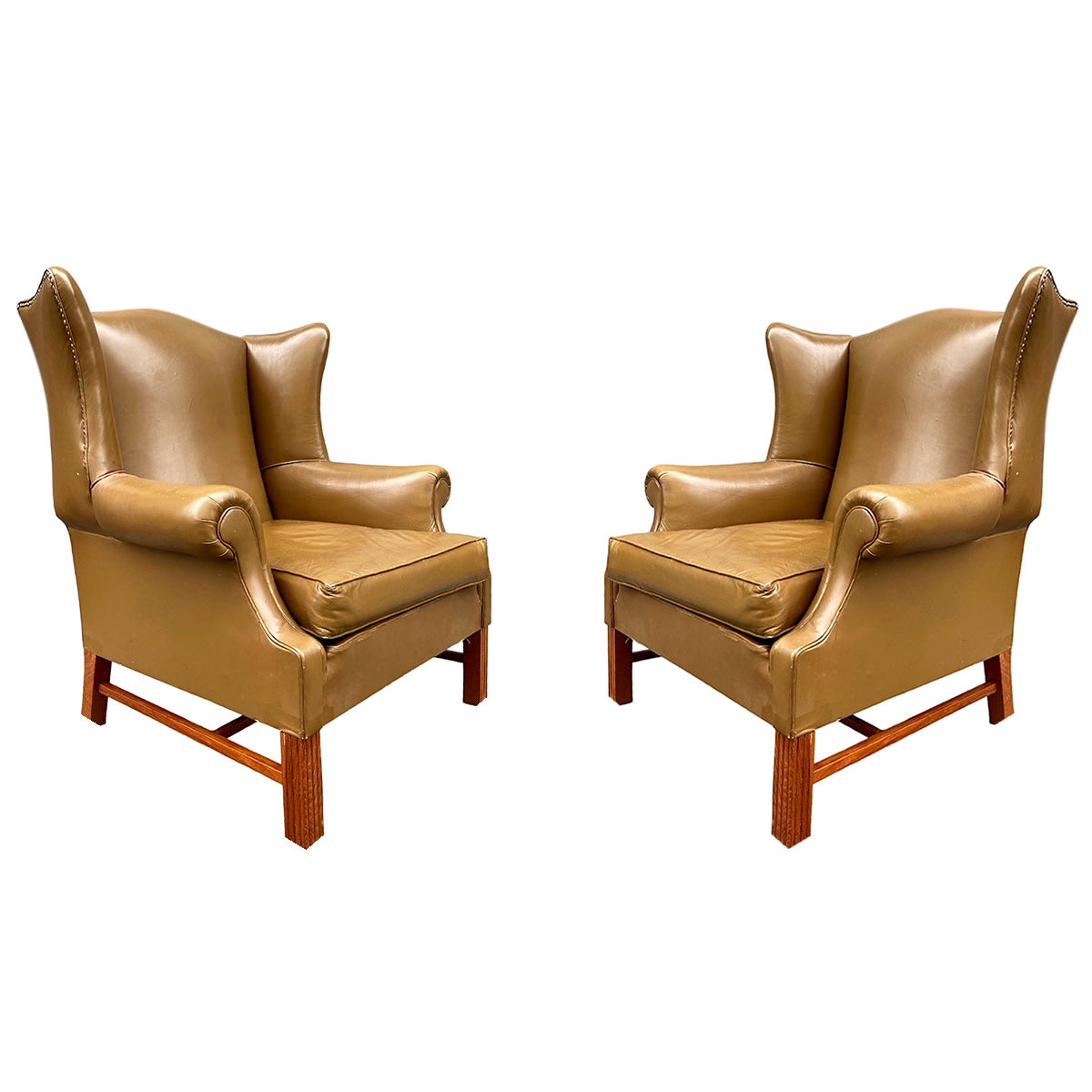Par de sillas orejonas Camacho Roldan. 1960