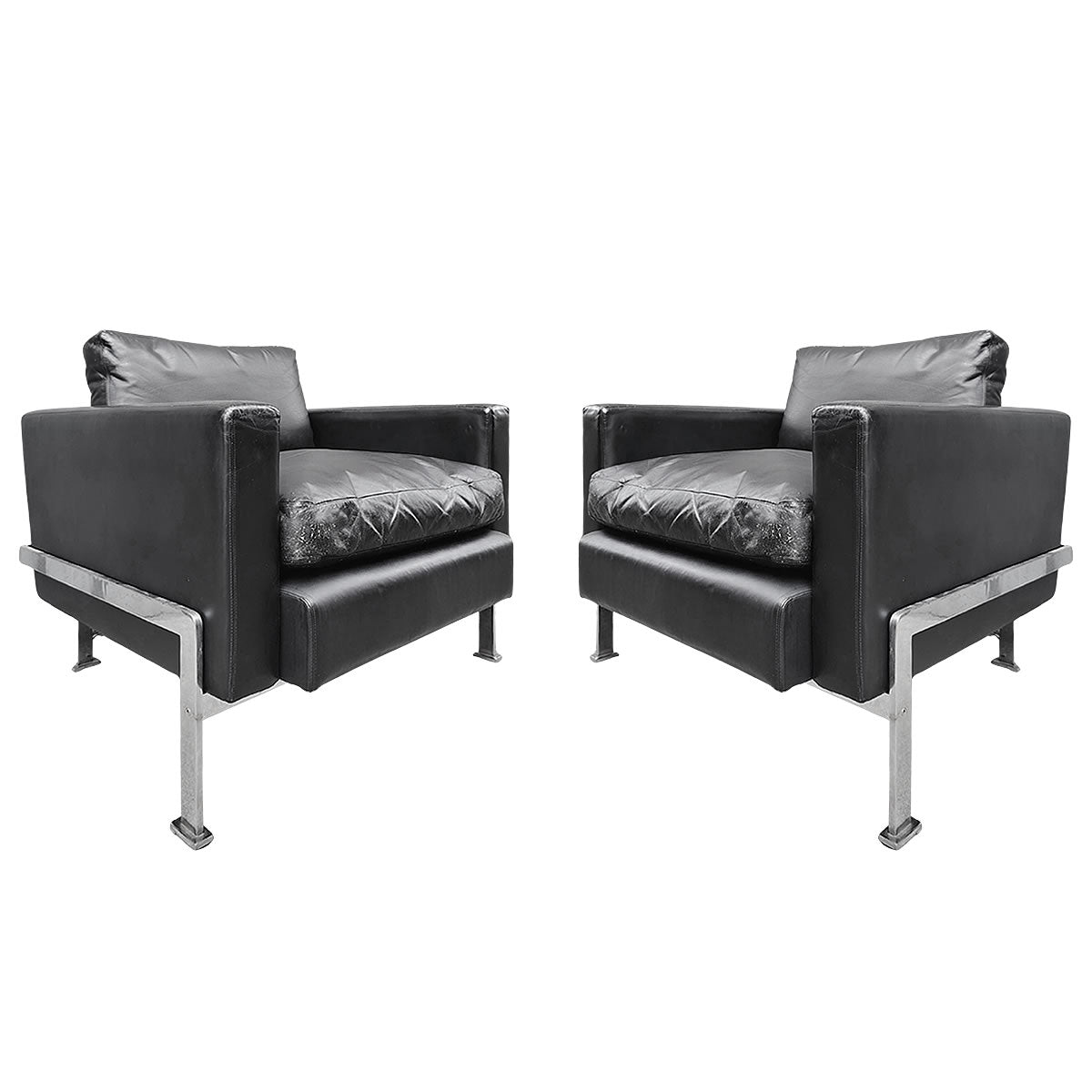 Par de sillas. cuero y cromo. 1970